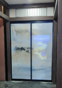 山水画夹胶玻璃电动地弹门
